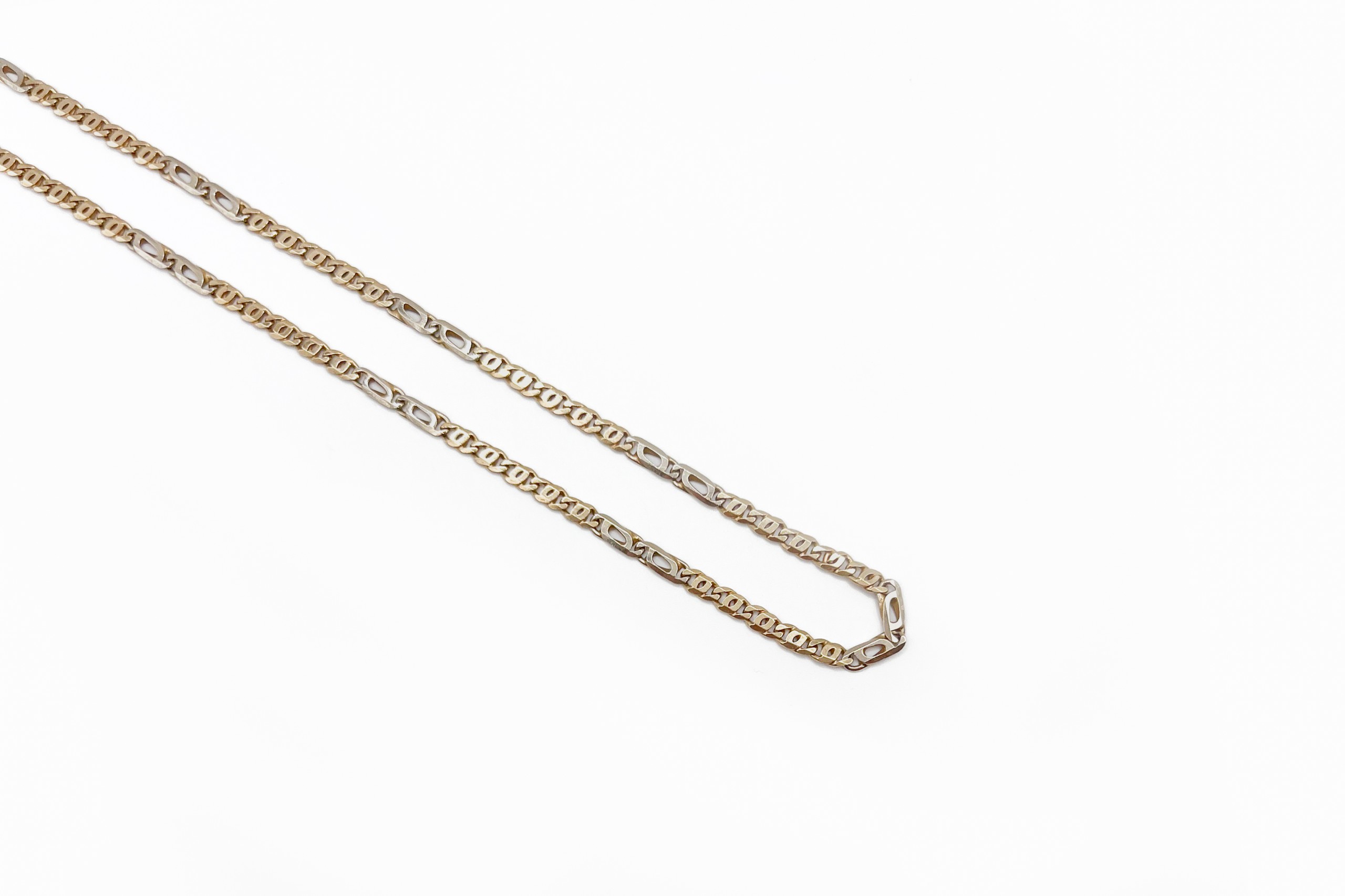 Cadena fígaro de oro de 18K