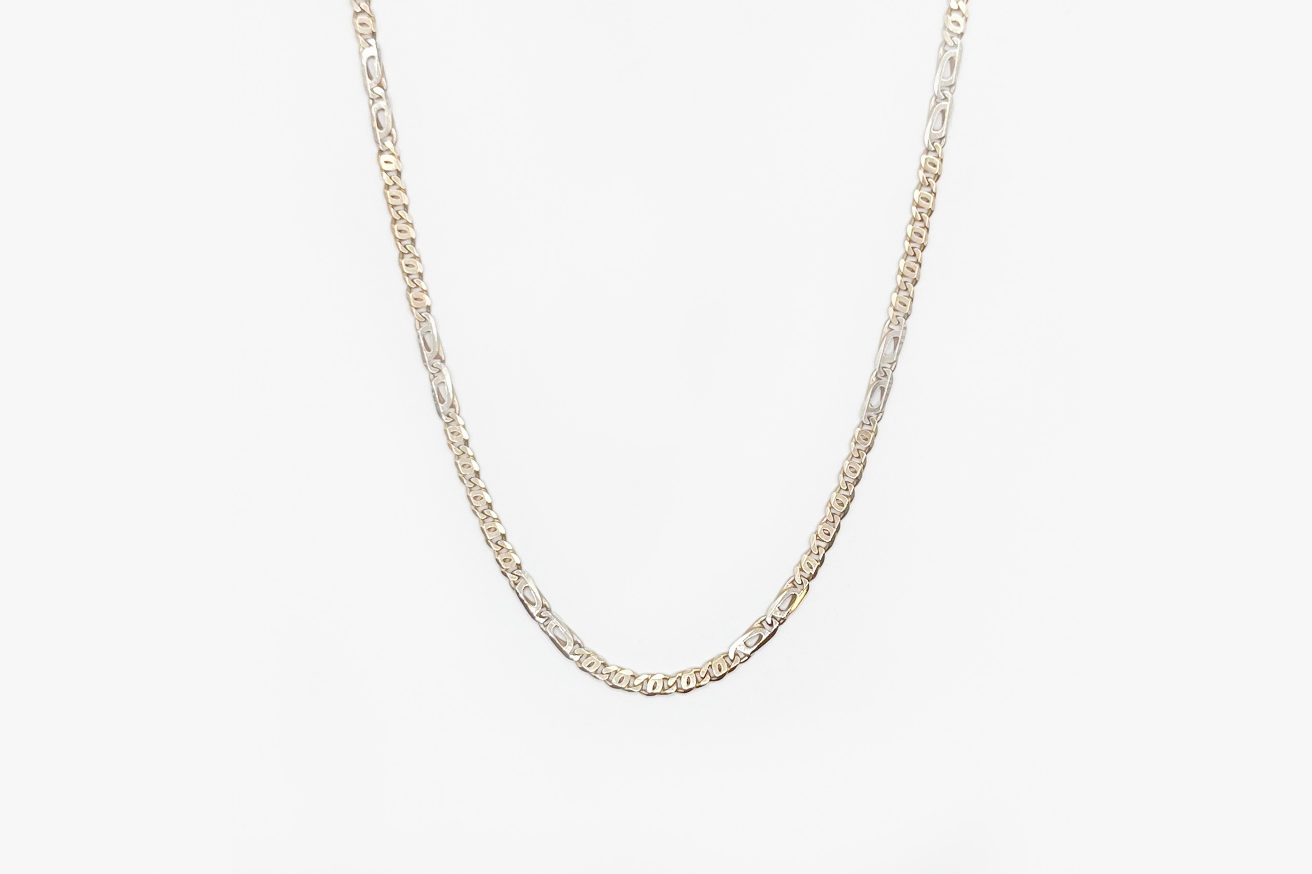 Cadena fígaro de oro de 18K