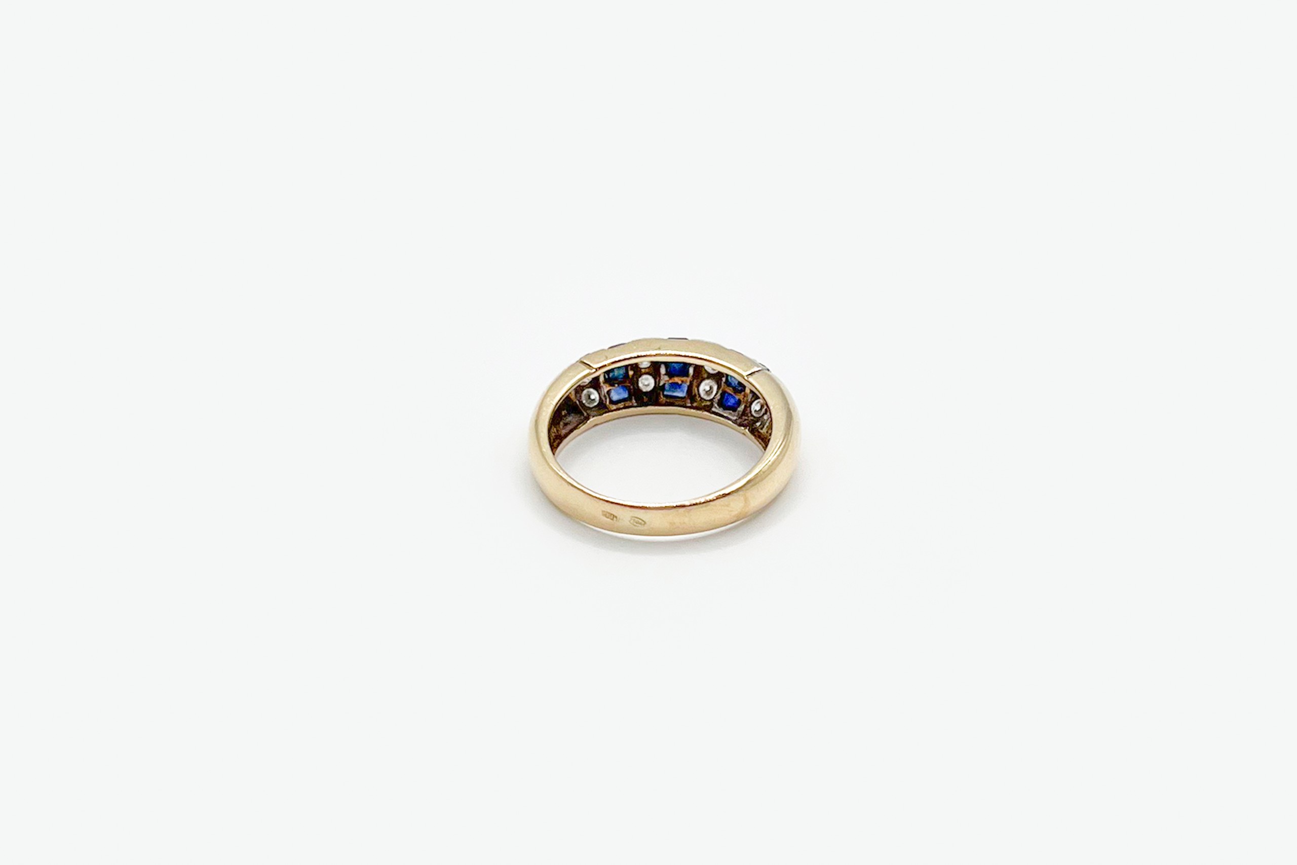 Anillo de oro de 18K con piedras de color