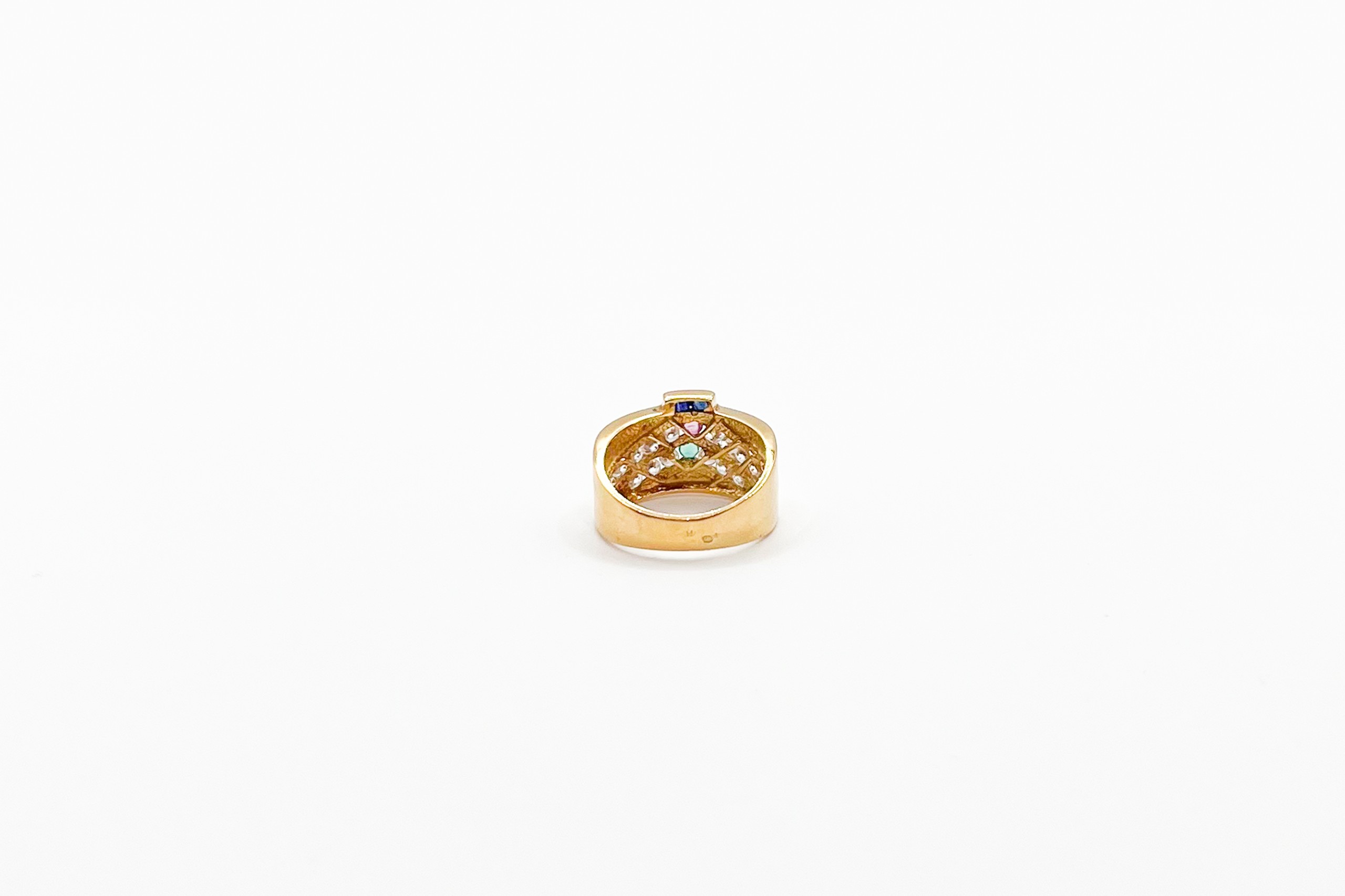 Anillo de oro de 18K con piedras de color