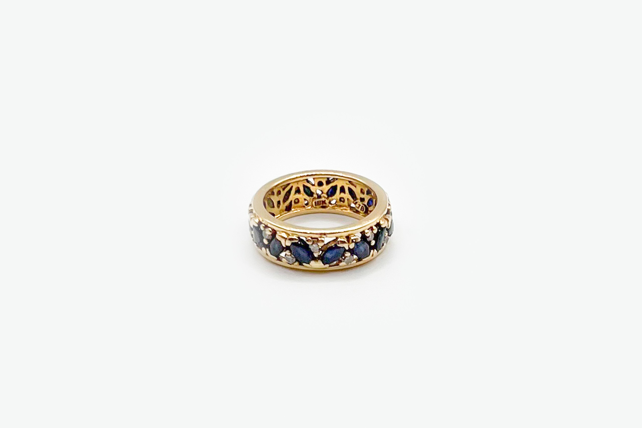 Anillo de oro de 18K con piedras de color