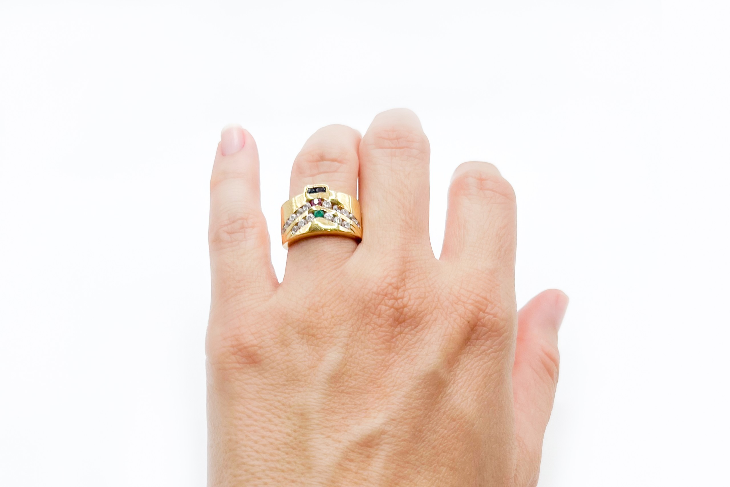 Anillo de oro de 18K con piedras de color