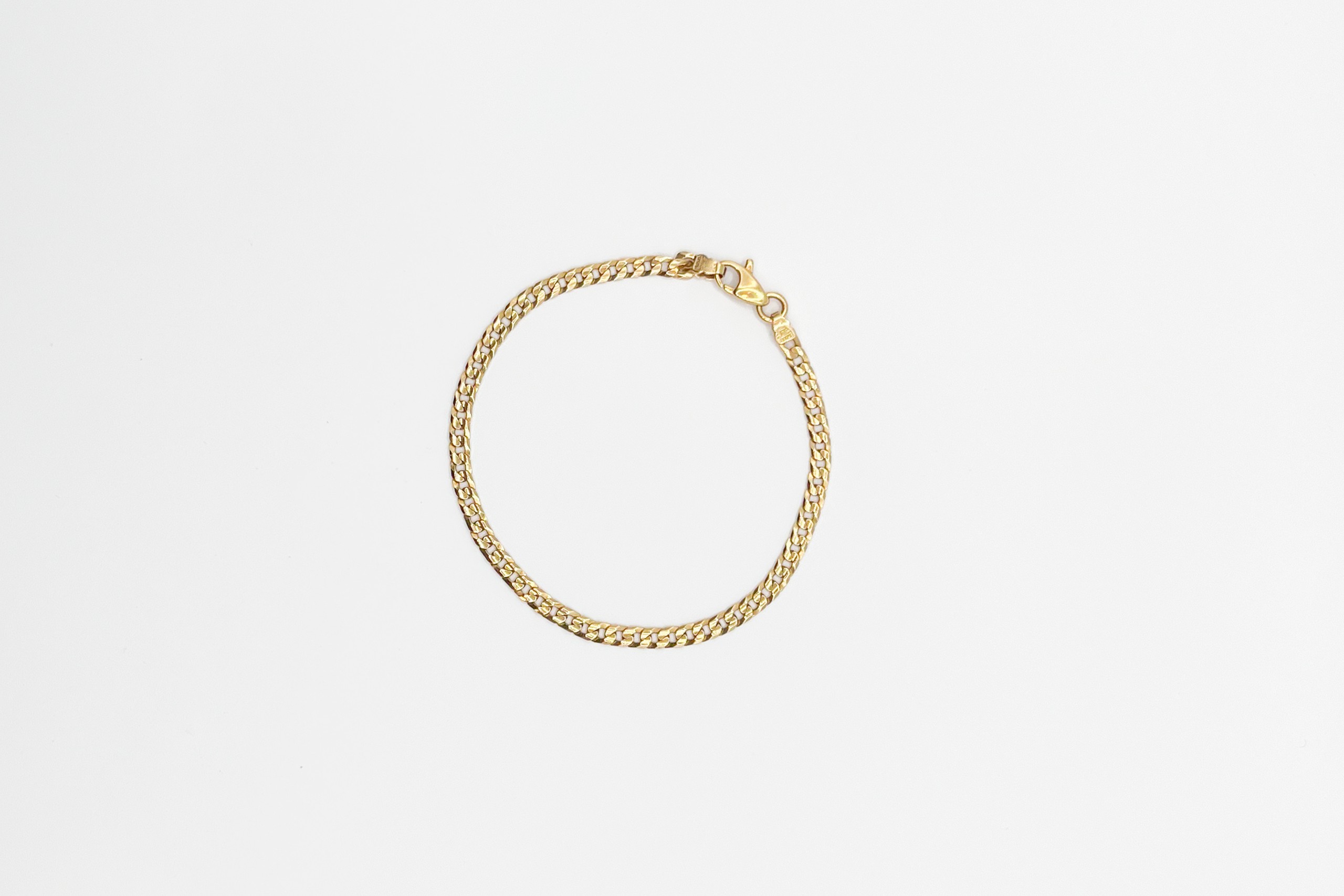 Pulsera tipo barbada de oro de 18K