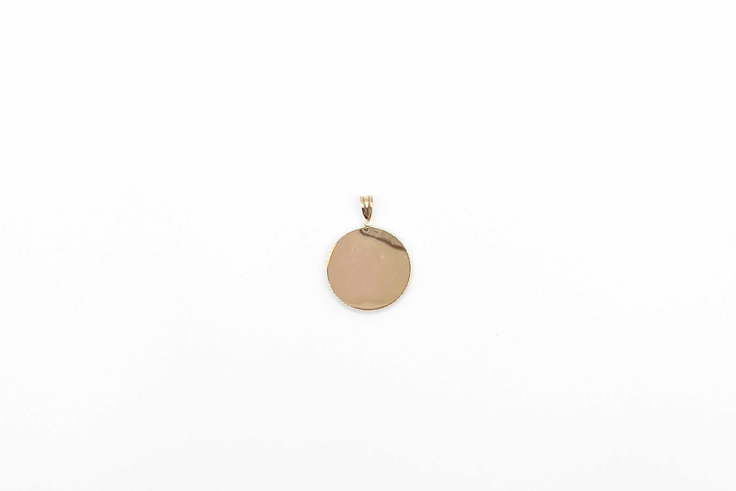 Colgante tipo medalla de oro de 18K